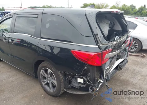 2020 Honda Odyssey Touring z USA, uszkodzony, nr VIN 5FNRL6H84LB037439